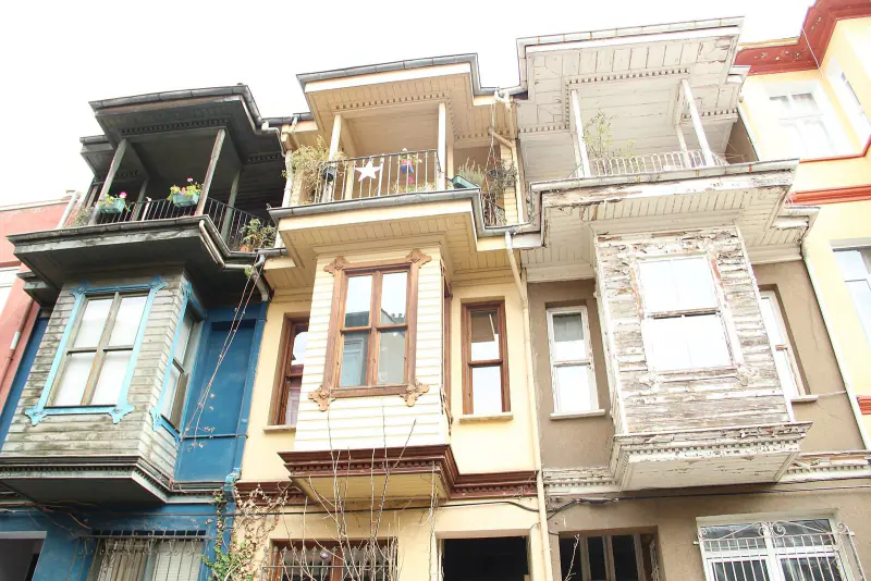 Old houses with wooden bay windows on a street in Kuzguncuk, Istanbul