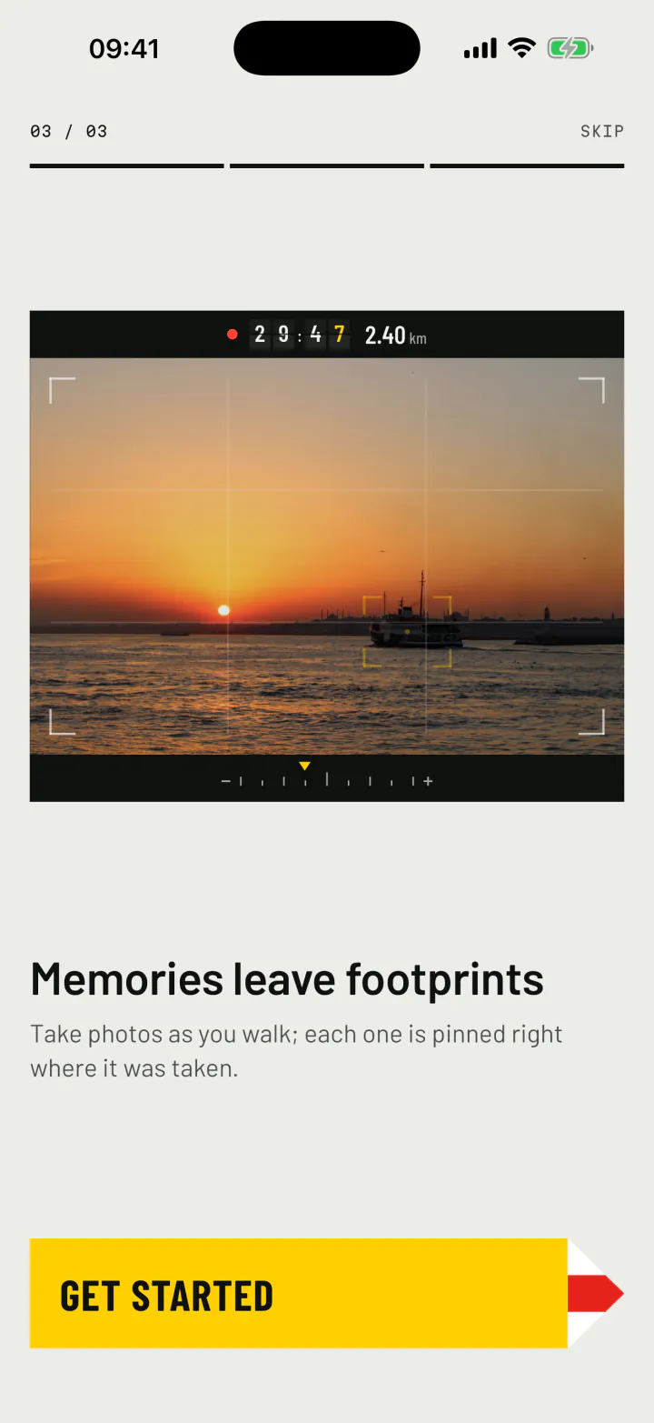 The camera on a walk: a sunset over the water, the walk's time and distance glowing in the viewfinder